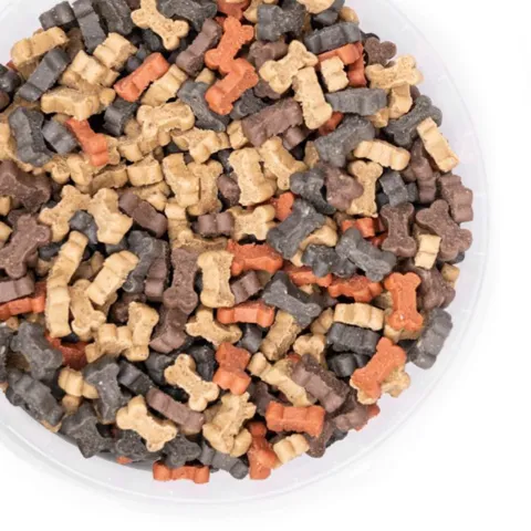 Farverige semi-moist hundegodbidder formet som små ben. Bløde og smagfulde træningssnacks fra Snack'it, velegnet til både hvalpe og voksne hunde.