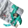 Dinobog med knitrelyse og piv