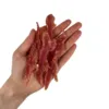 Faunakram duck breast fillet 300g bløde hundegodbidder med høj andel and vist i hånden